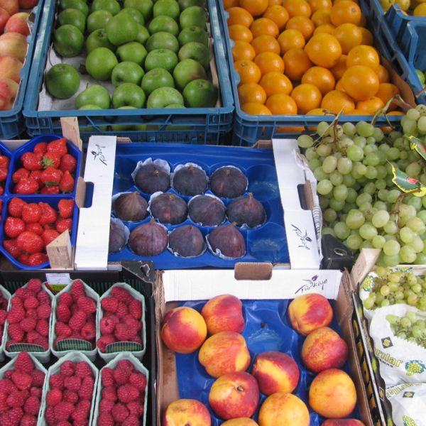 Fresh healthy bio red and green apples on street farmer market