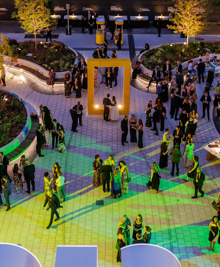 People gathered in the National Geographic Museum Courtyard.
