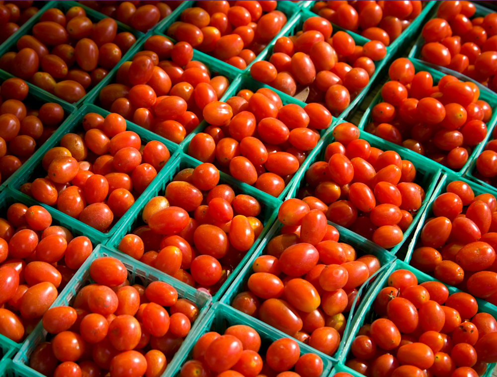 Tomatoes in a farmstand.