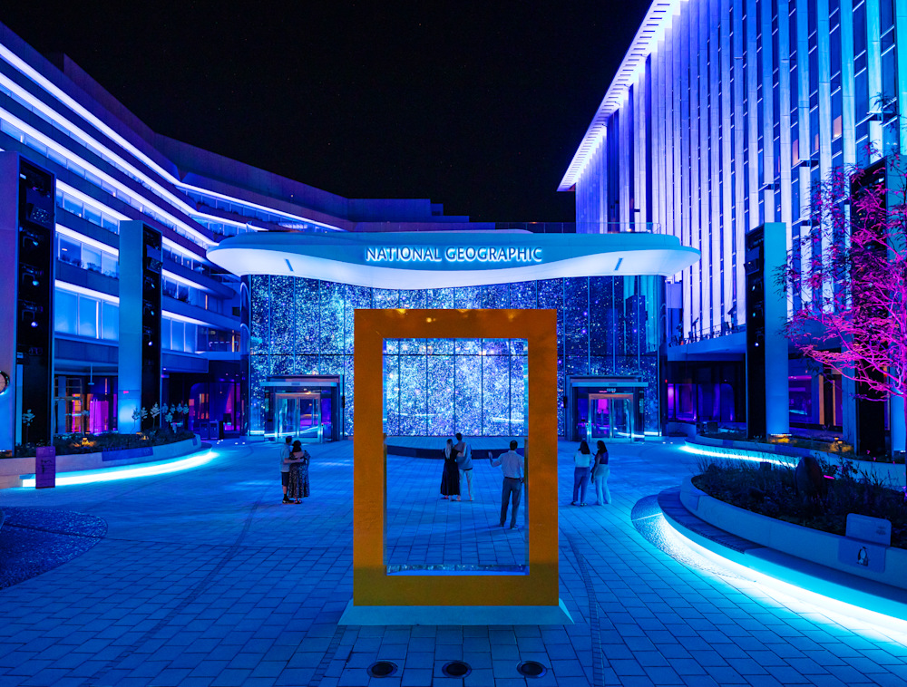 A view of the Wonders of Our World show through the National Geographic border in the National Geographic Museum Courtyard.