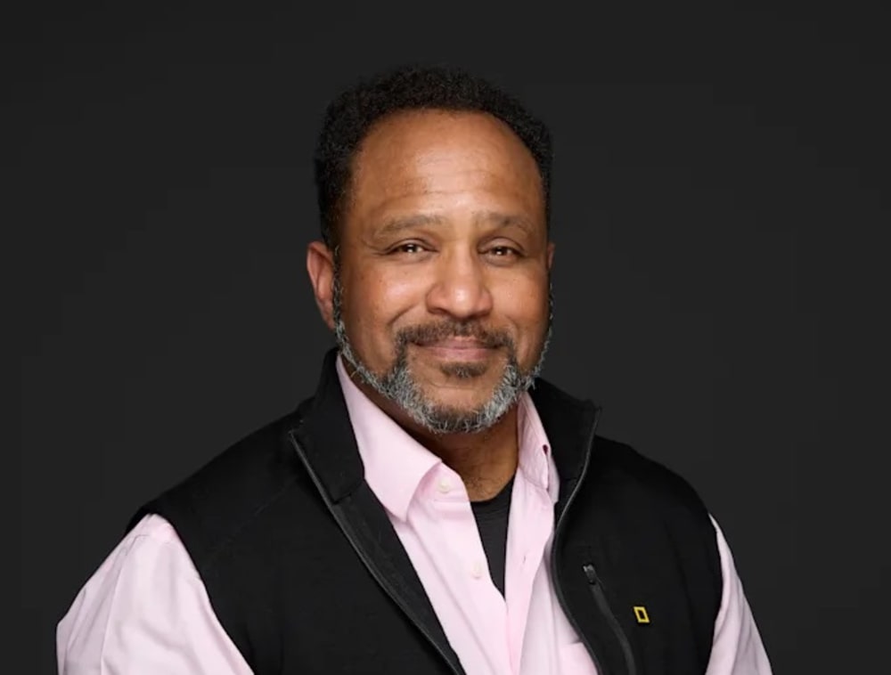 Headshot of James Edward Mills.