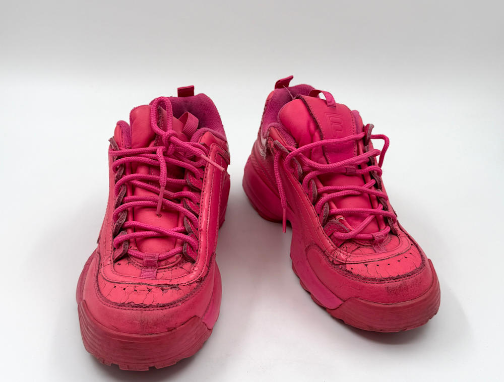 Malaika Vaz's pink sneakers.
