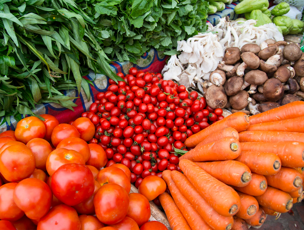 A close up of produce at a farmstand.
