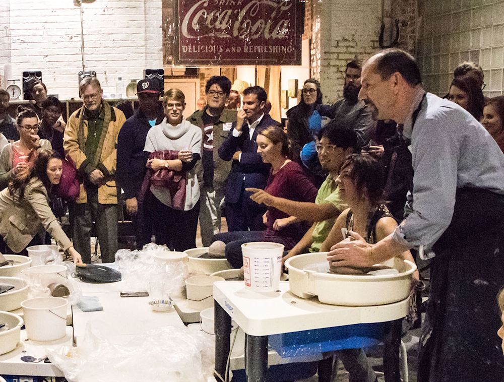 Photo of a group of people at District Clay Center.