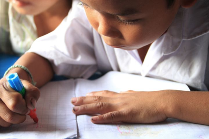 Picture of student doing homework.