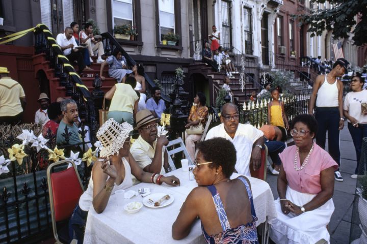 Photo of people at an outdoor party.