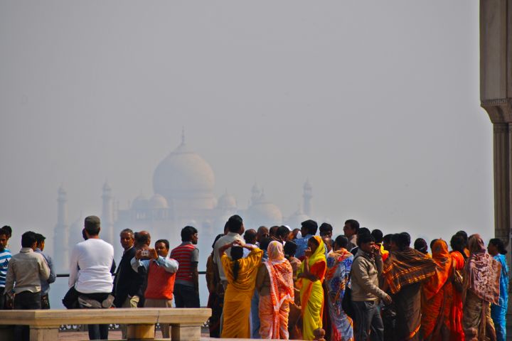 Photograph of Taj Mahal in India with pollution obscuring view.