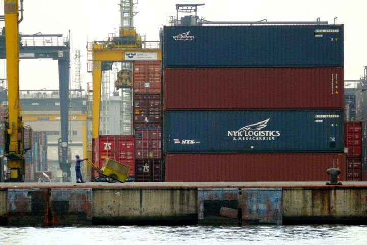 Photograph of shipping containers.
