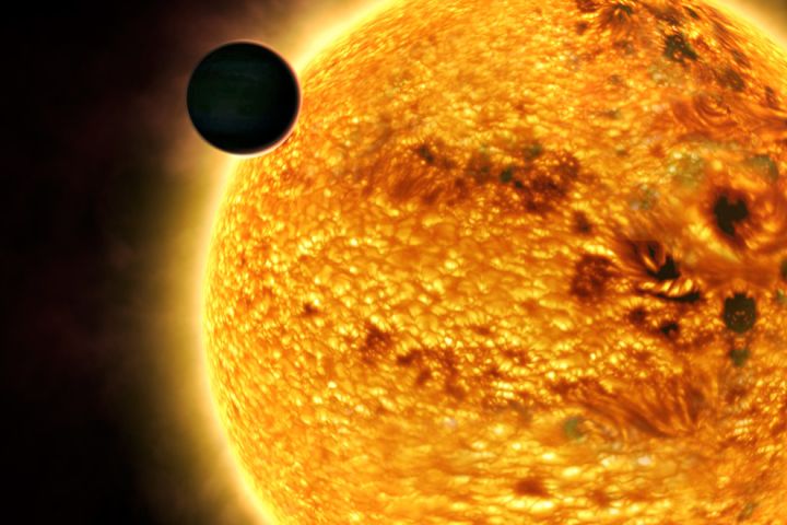 An artist's impression of a hot exoplanet orbiting close to its star.