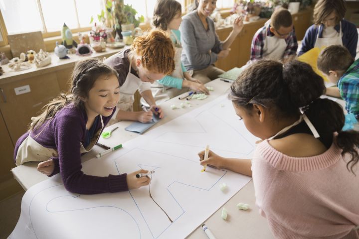 Students working on group project in art class