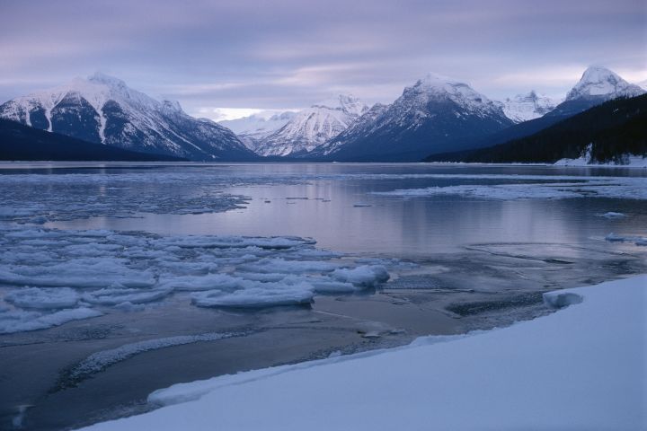 The Lewis Range and partially frozen Lake McDonald.