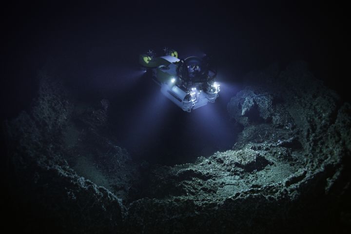Photo of a deep sea capsule on the ocean floor.