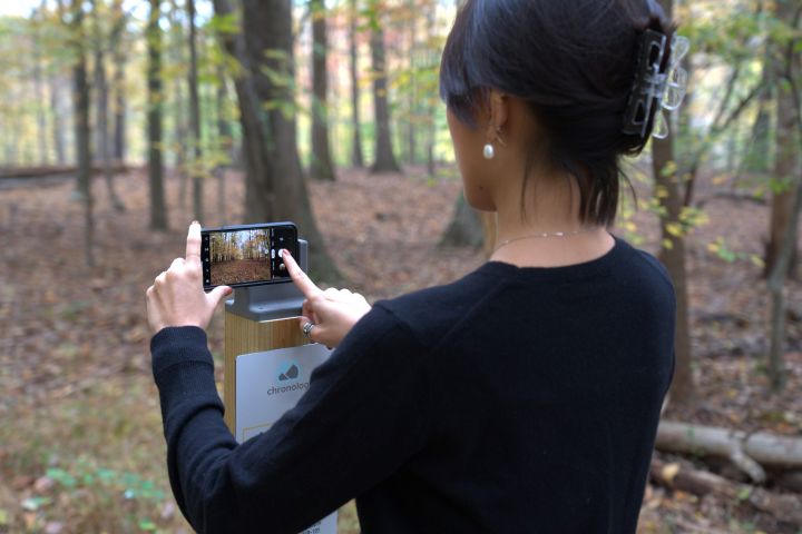 A person using chronolog in the forest
