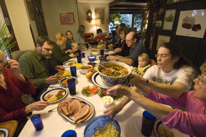 Organizing a potluck dinner is one way to encourage camaraderie, as seen in this American family in Lincoln, Nebraska.