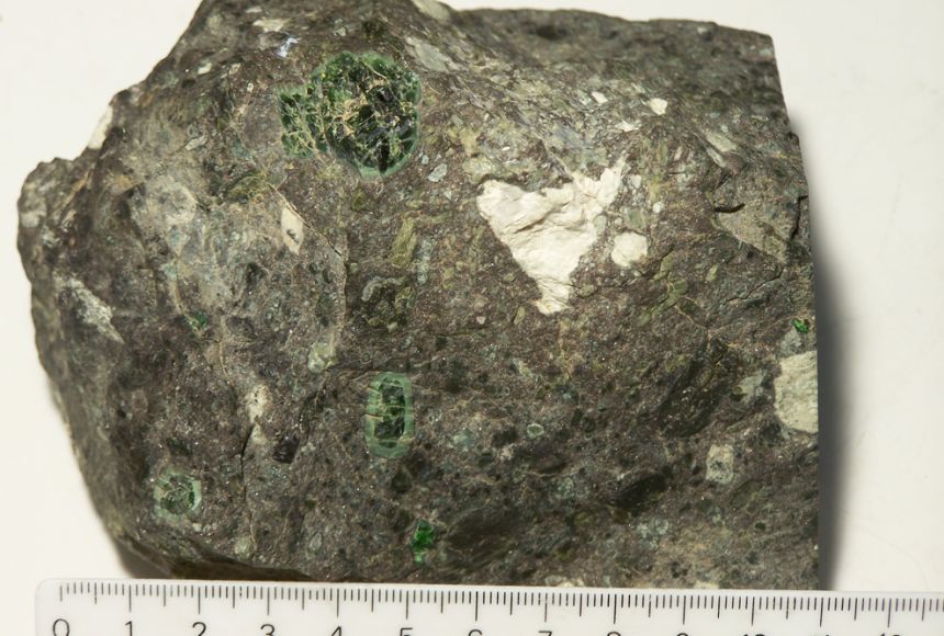 Identity Help : Igneous rock filled with many small green crystals