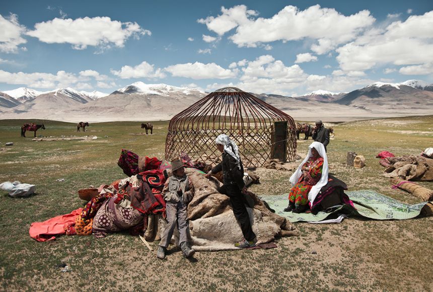 People putting up a Yurt in Mongolia 