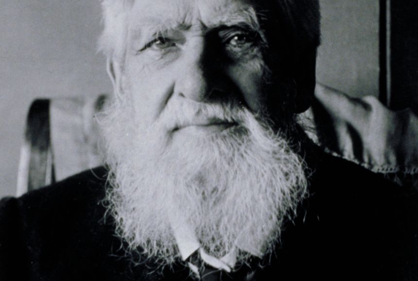 Black and white image of a bearded Alfred Wallace.