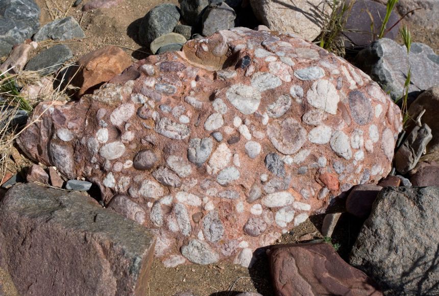An example of a sedimentary rock, which is, by definition, composed of many, smaller rocks.