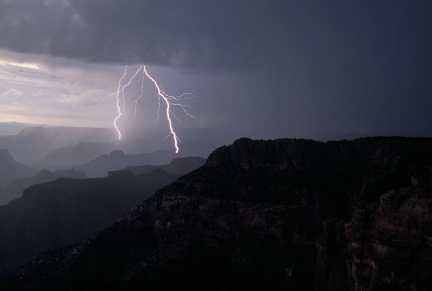 Weather—like this lightning storm in the Grand Canyon, Arizona—refers to short-term changes in the atmosphere, whereas climate refers to atmospheric changes over longer periods of time.