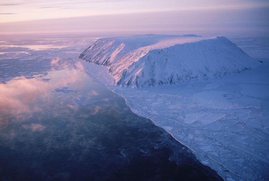 Tundras—like Little Diomede Island, Alaska, United States—are places of scarcity with little rain and vegetation. These cold, windy environments, however, are threatened by global warming.