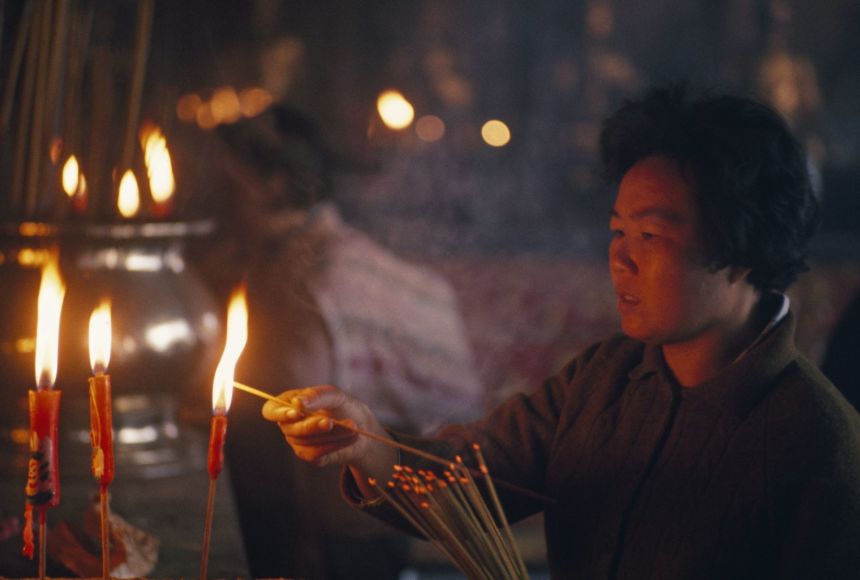 Incense are lit inside of Kun Yam Temple in Macao. Incense and meditation play an important role in Buddhism.