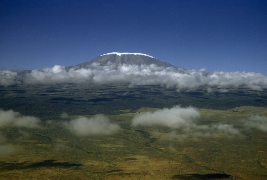 Located in Tanzania, Mount Kilimanjaro is the African continent's highest peak at 5,895 meters (19,340 feet). The majestic mountain is a snow-capped volcano.