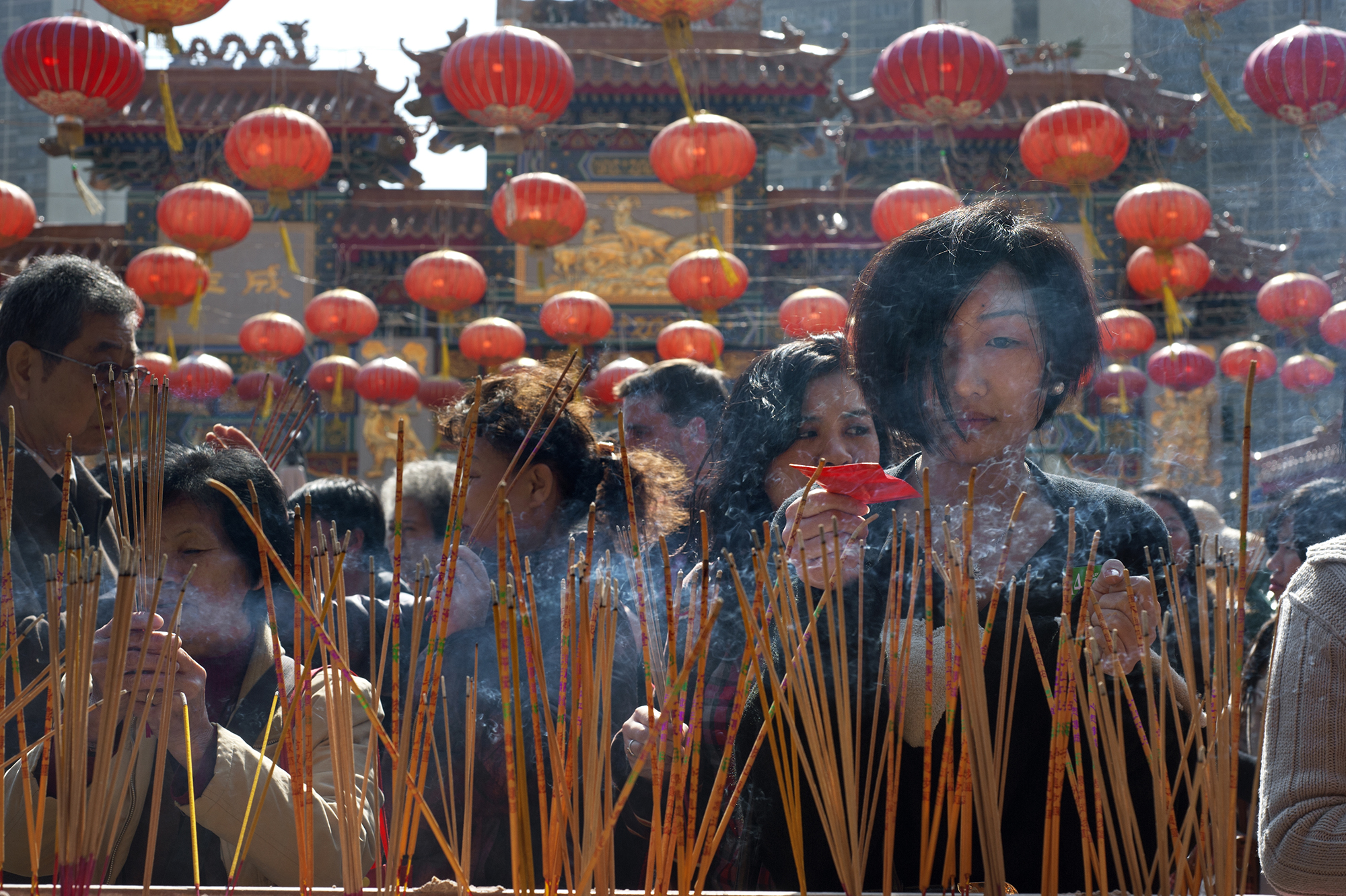 Chinese Religions And Philosophies   Lighting Incense For Luck 