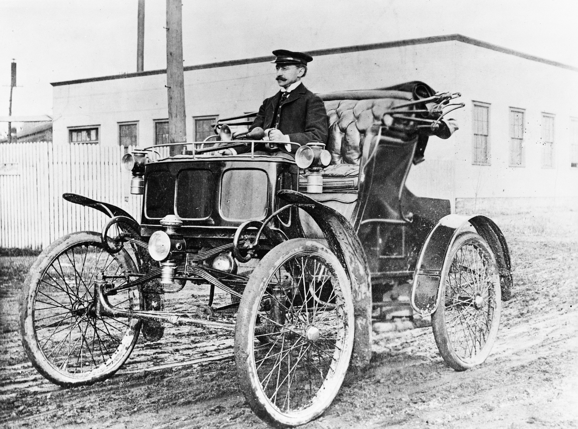 In what year was the first car powered by an electric deals motor